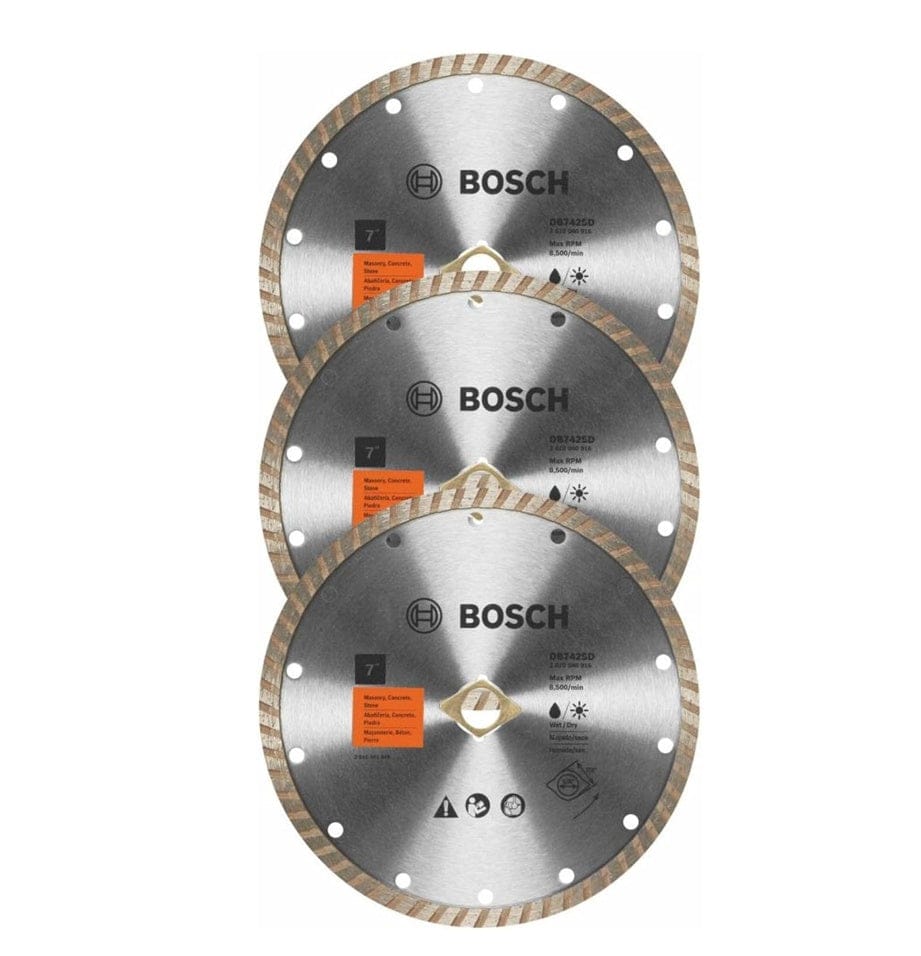 BOSCH DB742SB3 3 pc. 7" Standard Turbo Rim Diamond Blades for Smooth Cuts. 
The image shows a stack of three identical circular diamond blades, each with a silver-gray center and a light brown, ridged outer rim. The "BOSCH" logo is prominently featured in black text near the top of each blade, along with various technical specifications and safety icons.