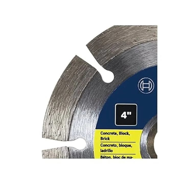 Close-up of 4-inch segmented diamond blade labeled for cutting concrete, block, and brick, with multilingual text and visible cutting segments.