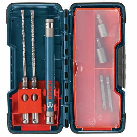 An overhead overhead photo showing the blue Bosch hard shell storage organizer case opened flat, cleanly holding the masonry drill bits, anchor drive sleeve, Phillips screwdriver tips, and nutsetter sockets in customized molded retention slots.