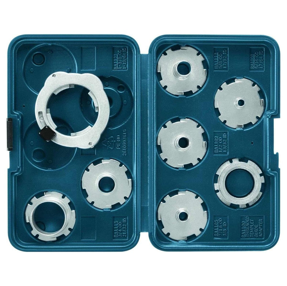 BOSCH 8-Piece Router Template Guide Set RA1128. This overhead shot shows an open Bosch RA1128 8-piece router template guide set, neatly arranged within its deep blue plastic carrying case. The case has two halves, each holding four circular, silver-colored metal template guides of various sizes, with one larger, thicker guide positioned on the left side of the opened case.
