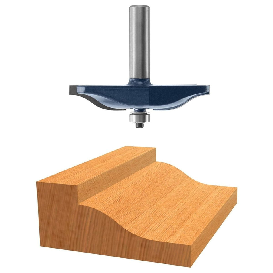 Studio view of the Bosch 85640M router bit hovering above a wood block that demonstrates the resulting ogee raised panel profile cut.