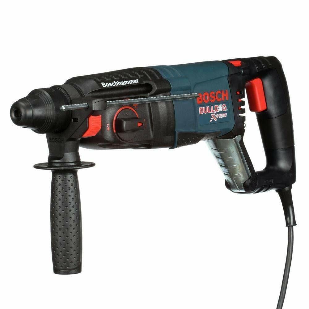A three-quarter profile of the Bosch Bulldog Xtreme rotary hammer, highlighting the D-handle, auxiliary handle, and depth gauge.