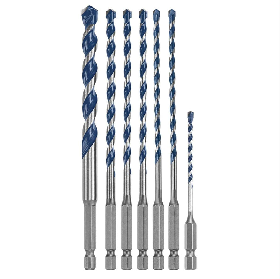 A clean studio product shot of the seven assorted masonry drill bits included in the Bosch BXH7S kit arranged symmetrically by size from tallest to shortest against a solid white background, showcasing their individual 1/4-inch hex mounting shanks, varying lengths of blue-painted spiral flutes, and precision-ground carbide cutting points.