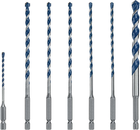 A front-facing close-up studio shot of the seven masonry bits from the Bosch Blue Xtreme multi-pack kit showing a clear comparison of the body thicknesses and broad blue spiral flute paths tapering down to their common hex shank bases against a white background, arranged with the shortest bit on the far left.