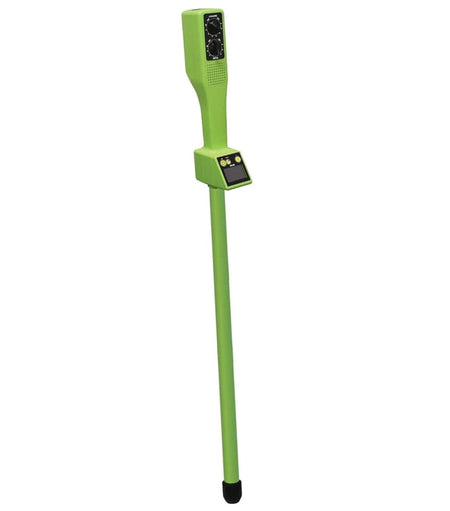 A full-length view of the lime green magnetic locator showing the control housing with volume and sensitivity knobs, an LCD unit with "Erase" and power buttons, and a long aluminum detection tube with a black rubber tip.