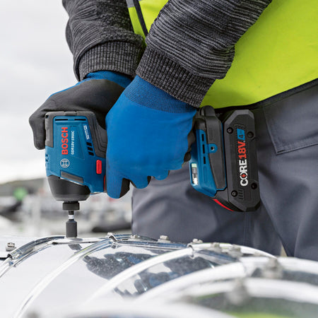 Two-handed control driving sheet metal fasteners into ductwork using the high-torque Bosch 18V impact driver.