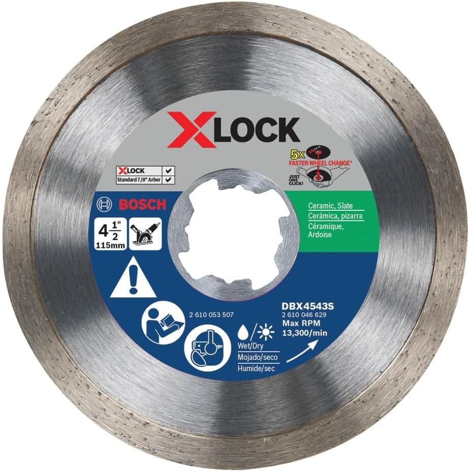 Close-up view of the Bosch DBX4543S X-LOCK 4-1/2 inch continuous rim diamond blade, showing the X-LOCK mounting interface, safety icons, and labels for cutting Ceramic, Slate, and Tile wet or dry with a maximum RPM of 13,300.