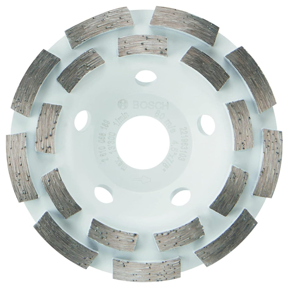Product studio shot facing the front layout of the Bosch DC4518 4-1/2 Inch Double Row Segmented Rim Diamond Cup Wheel on a white background, highlighting its circular white steel base plate, a 7/8-inch center unthreaded arbor hole, surrounding airflow cooling vents, and 18 aggressively spaced double-row abrasive diamond grinding segments.