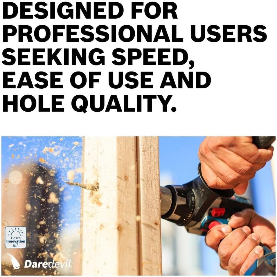 Action shot of a person using a drill with a Daredevil spade bit to bore a hole through a wooden stud.