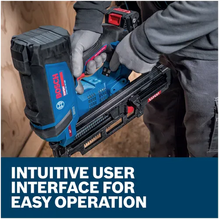 A close-up view of a builder's hands adjusting settings on the electronic control interface panel located on the base handle platform of the Bosch compressorless framing tool. Text outlines show an intuitive user interface designed for easy operation and smooth switching between single-shot and high-velocity bump-fire modes.