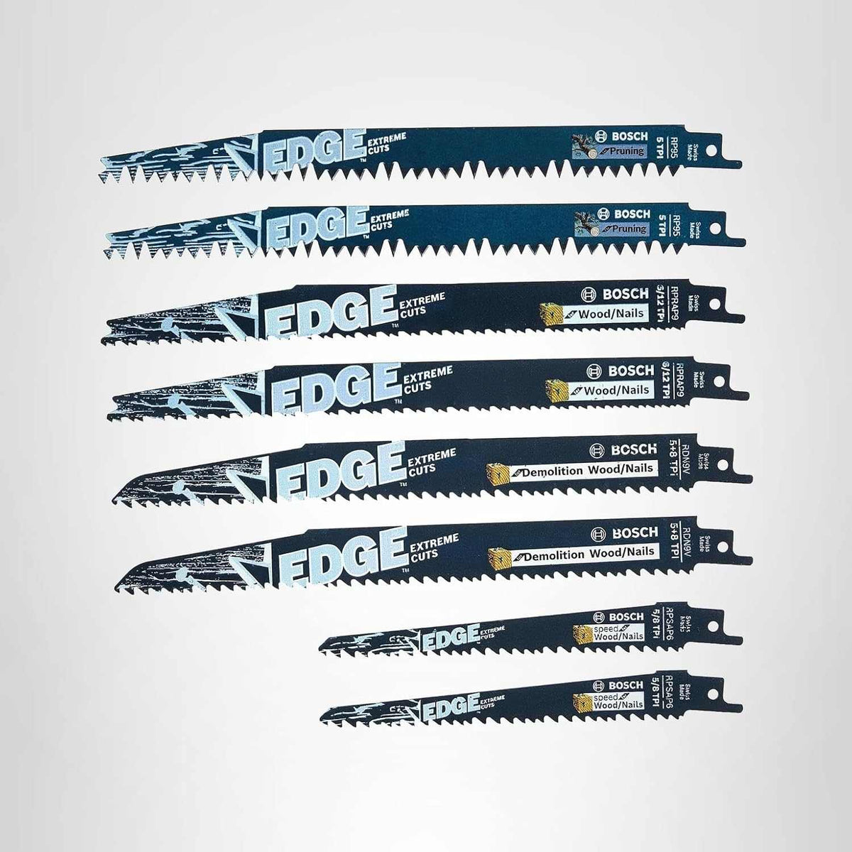 Studio view of the 8-piece Edge Pro-Wood reciprocating saw blade set arranged vertically, displaying a variety of blades for pruning, wood with nails, and demolition applications.