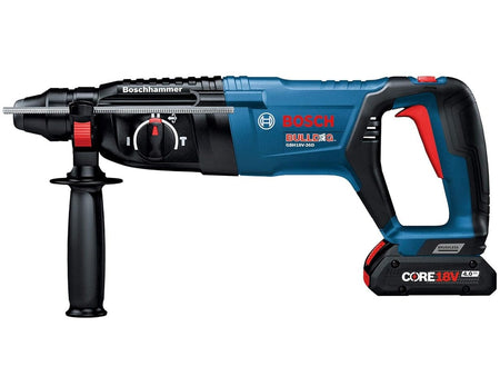 A high-resolution side profile of the Bosch GBH18V-26DK15-RT cordless rotary hammer showing the SDS-Plus chuck, multi-function mode selector, and the attached CORE18V 4.0 Ah compact battery.