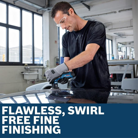 A close-up application shot showing a detail craftsman finishing a premium mirror-like black vehicle surface using the Bosch GEX12V-77N cordless paint scratch sander. The image captures the dynamic finishing motion on the bodywork inside an automotive workshop, accompanied by lower text reading Flawless, swirl-free fine finishing.