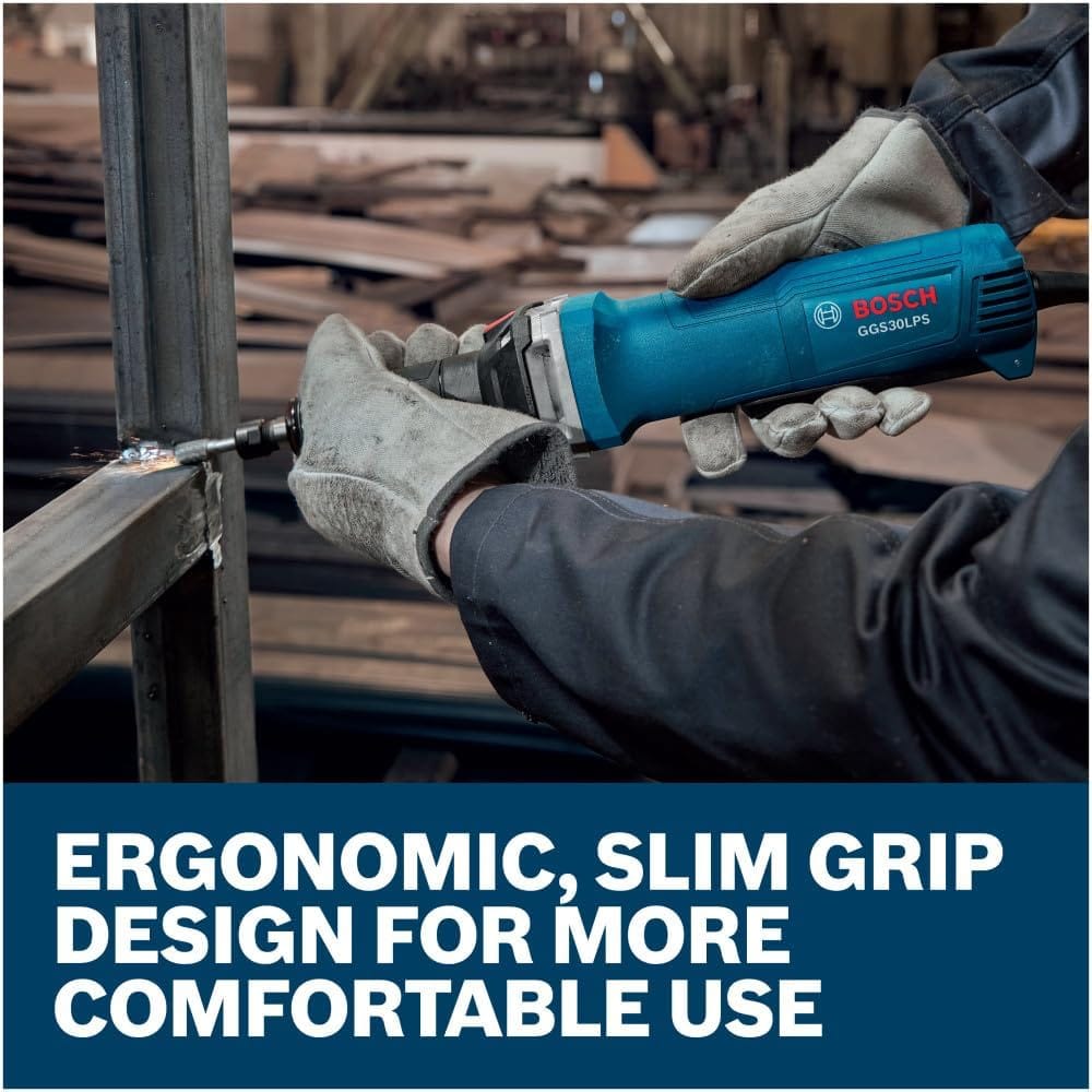 A close-up action application view of a metal fabricator wearing protective work gloves firmly holding the blue Bosch straight die grinder horizontally to debur and clean up internal welding beads along an open steel box frame structure.