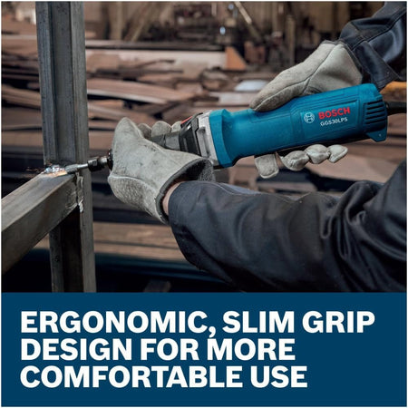 A close-up action application view of a metal fabricator wearing protective work gloves firmly holding the blue Bosch straight die grinder horizontally to debur and clean up internal welding beads along an open steel box frame structure.