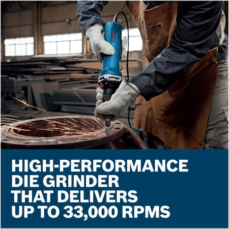 An industrial application shot showing an operator using the high-performance Bosch straight die grinder to clean out and debur structural bolt hole orifices along a massive heavy metal pipe flange connection ring on a workshop floor.