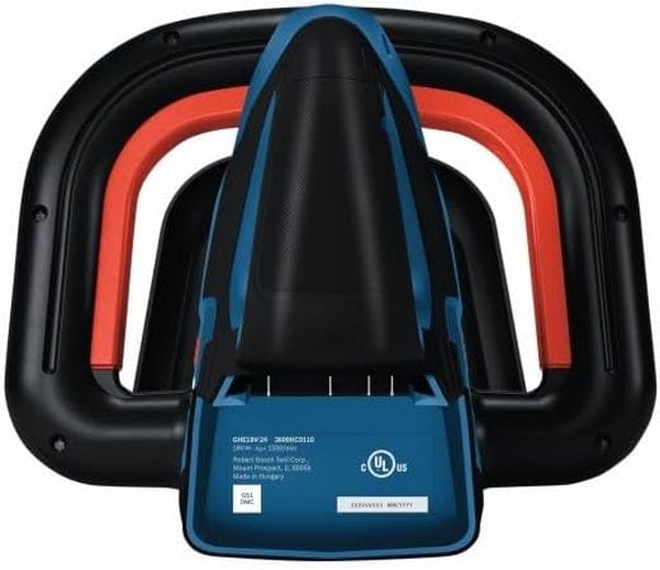 A top-down studio overview shot focusing directly onto the main power housing assembly head of the trimmer, highlighting the wide protective plastic hand guard ring wrapping around the ergonomic multi-position red-accented D-handle layout along with a clear view of the manufacturer specification and safety compliance labels.