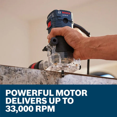 A woodworking artisan operating the high-speed Bosch GLF55-25 electric hand trimmer along a laminate edge profile. The clear view demonstrates steady manual guidance and excellent line-of-sight visibility into the cutting window, set above a bold blue informational graphic banner stating Powerful motor delivers up to 33,000 RPM.