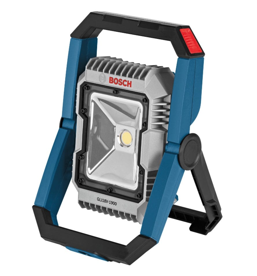 Professional studio shot of the Bosch GLI18V-1900 18V LED floodlight. The light features a blue and black frame with a swiveling stand and a silver heat sink around the central LED.