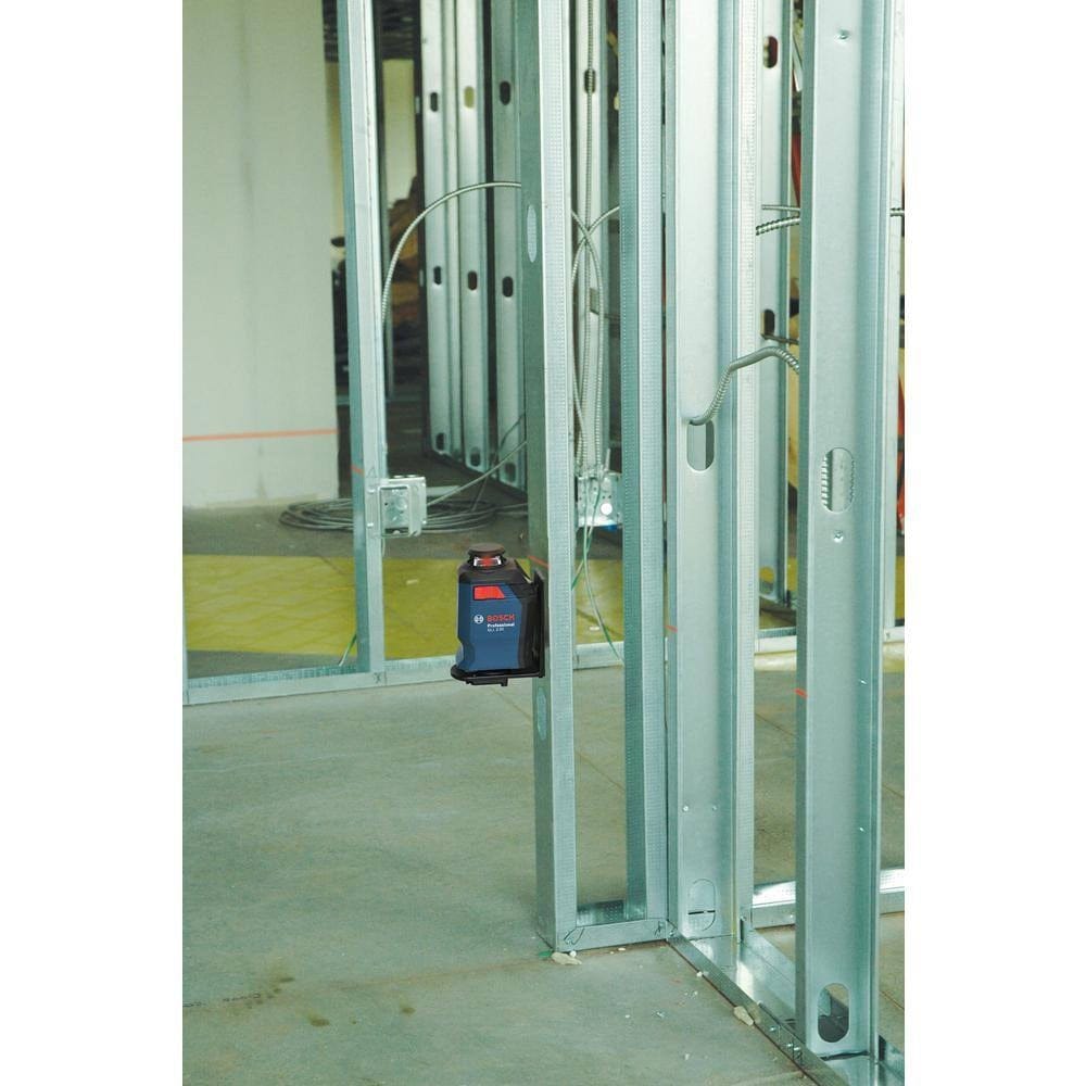 The Bosch GLL 2-20 laser level attached to a metal wall stud using the BM3 positioning mount, projecting a red horizontal line for electrical box alignment.