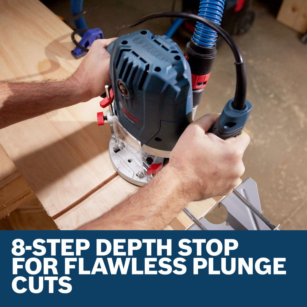 An overhead action shot of a professional woodworker guiding the Bosch GOF13-25 variable speed plunge router down a natural wood veneer material sheet. A blue dust extraction vacuum hose is connected to the top motor housing as the tool carves a clean dado joint groove, positioned above a lower text box stating 8-step depth stop for flawless plunge cuts.