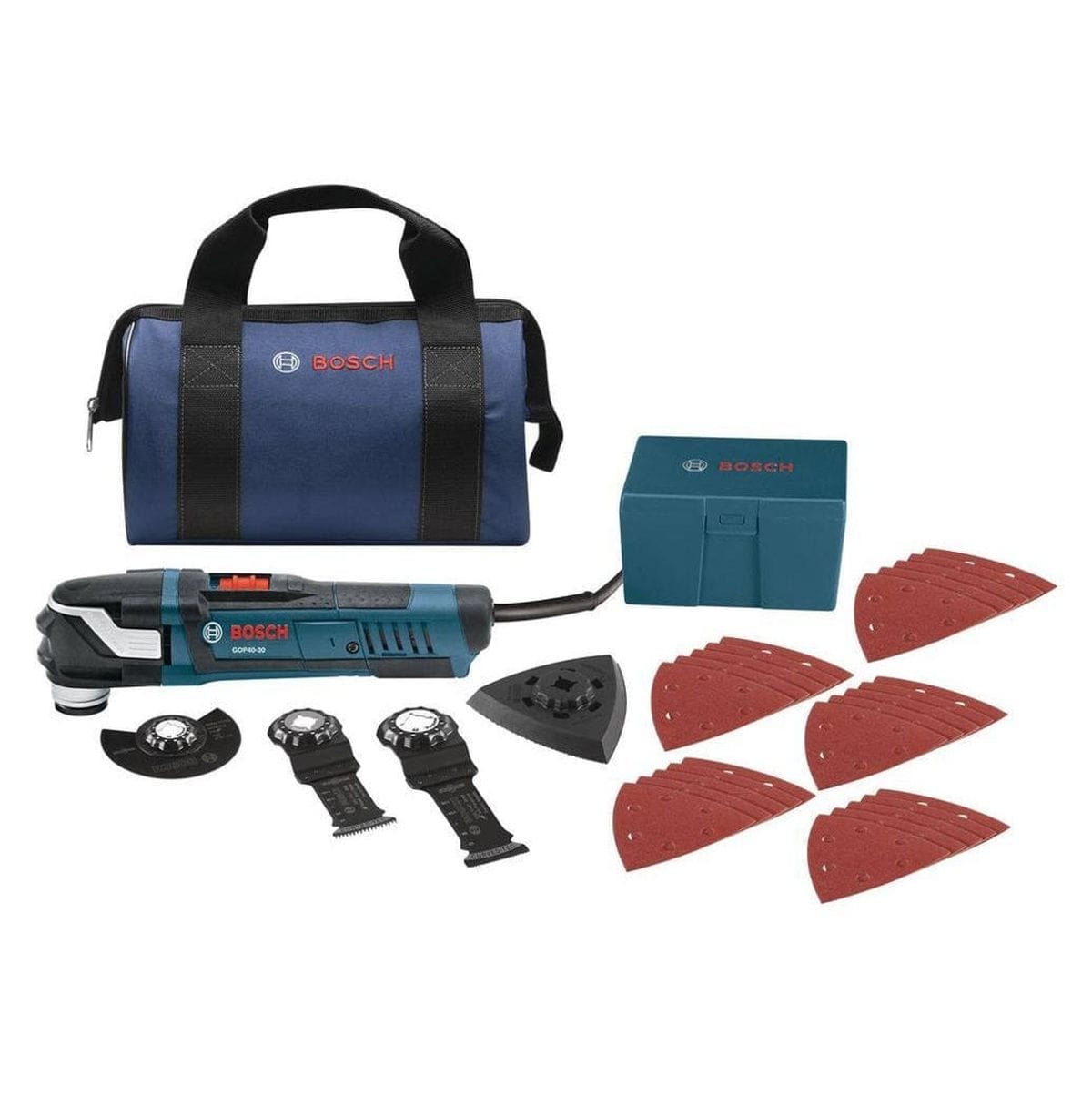 Bosch GOP40-30 multi-tool kit with carrying bag, accessory box, sanding pads, and cutting blades arranged on surface.