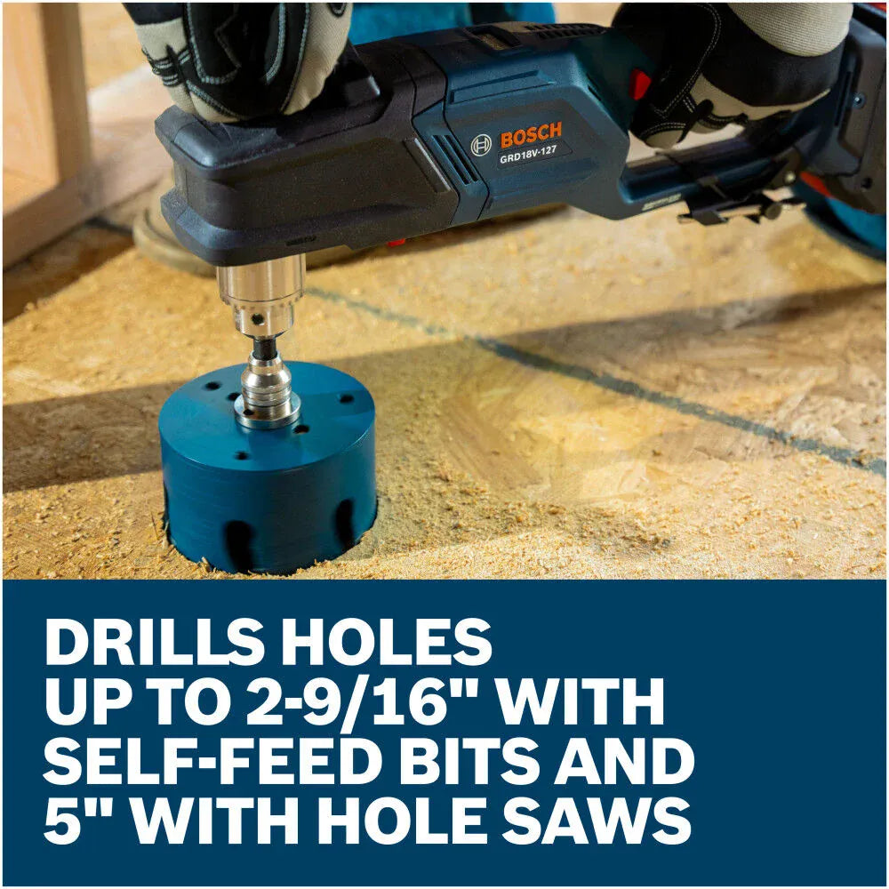 An operational on-site action view of a mechanical tradesman wearing protective work gloves firmly holding the Bosch cordless right angle drill to bore a wide structural utility hole straight through a thick wooden floor joist beam, capturing falling wood shavings and sawdust flour.