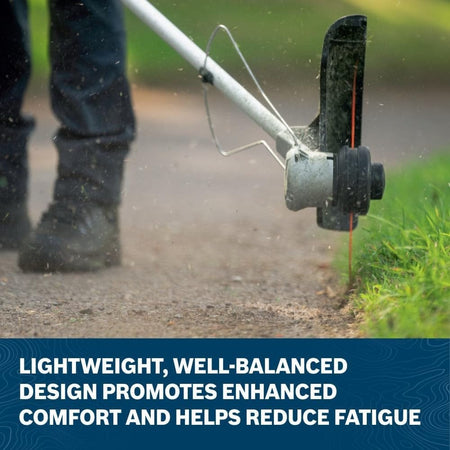 A close-up action shot of the Bosch 16 inch string trimmer head edging along a concrete walkway, showcasing the well-balanced design and specialized debris guard that promotes operator comfort and precision.