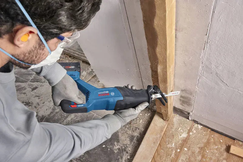 A high-conversion field action view identical to file GSA18V-280N 4.webp showing a structural carpenter using the Bosch GSA18V-280N brushless palm reciprocating saw to notch a wood timber base board. This variant drops all text overlays to provide an unhindered perspective of the tool's pivoting shoe alignment and comfortable barrel handle ergonomics.