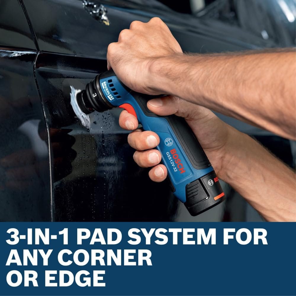 An automotive paint repair professional using both hands to firmly guide the Bosch GSS12V-32N cordless brushless detail sander across a vertical body panel. The micro 1-1/4 inch sanding pad works through white polishing compound, accompanied by a lower text box stating 3-in-1 pad system for any corner or edge.