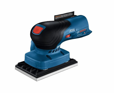 An angled upper perspective view of the blue Bosch GSS18V-40 cordless palm sander detailing the smooth contours of its rubberized hand grip and the prominent red toggle power button.