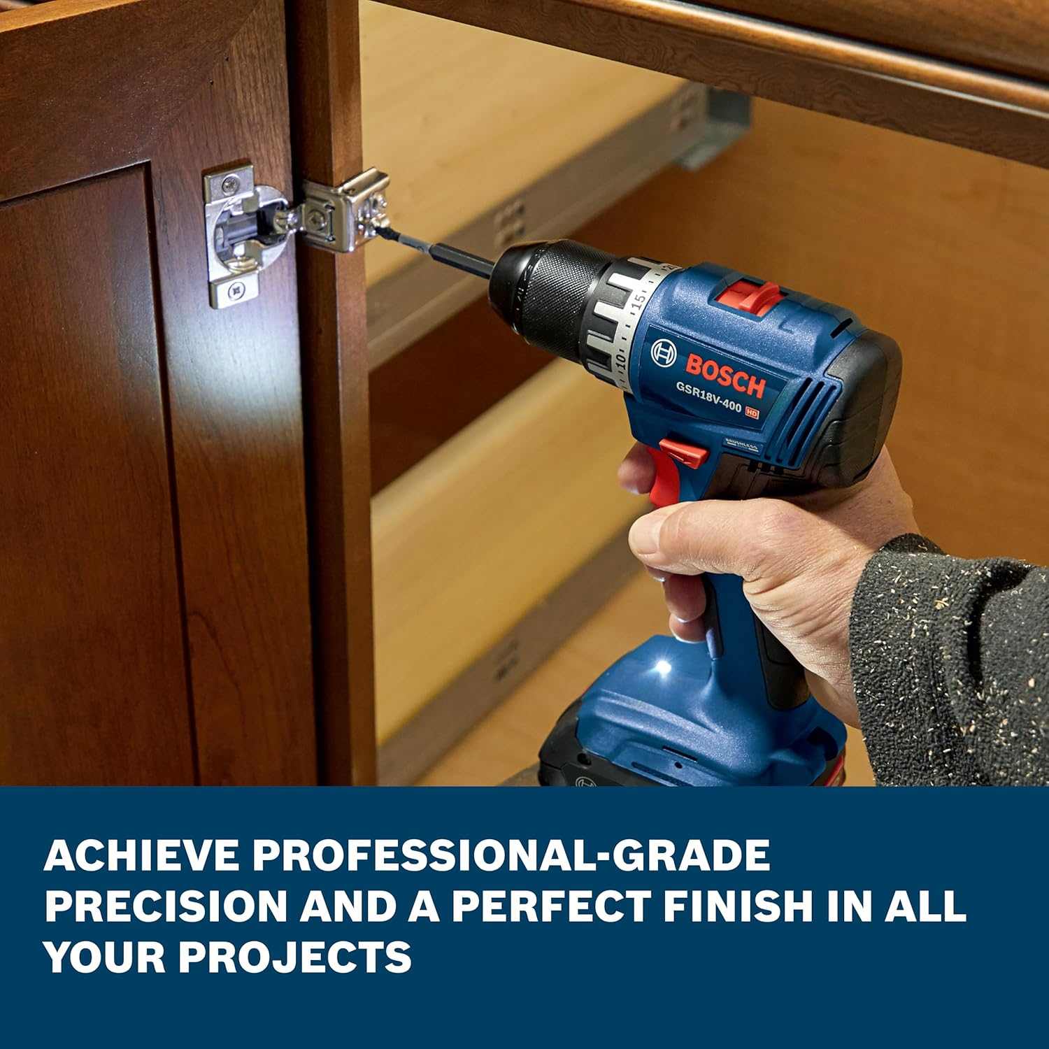 A close-up of a person using the Bosch 18V compact 1/2 inch drill driver to precisely install a metal hinge on a wooden cabinet door, accompanied by overlay text that reads achieve professional-grade precision and a perfect finish in all your projects.