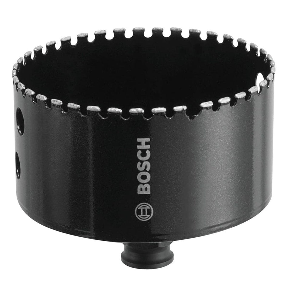 Studio shot of the black Bosch HDG358 diamond hole saw, showcasing the diamond grit cutting edge, side ejection slots, and integral quick change adapter on the bottom.
