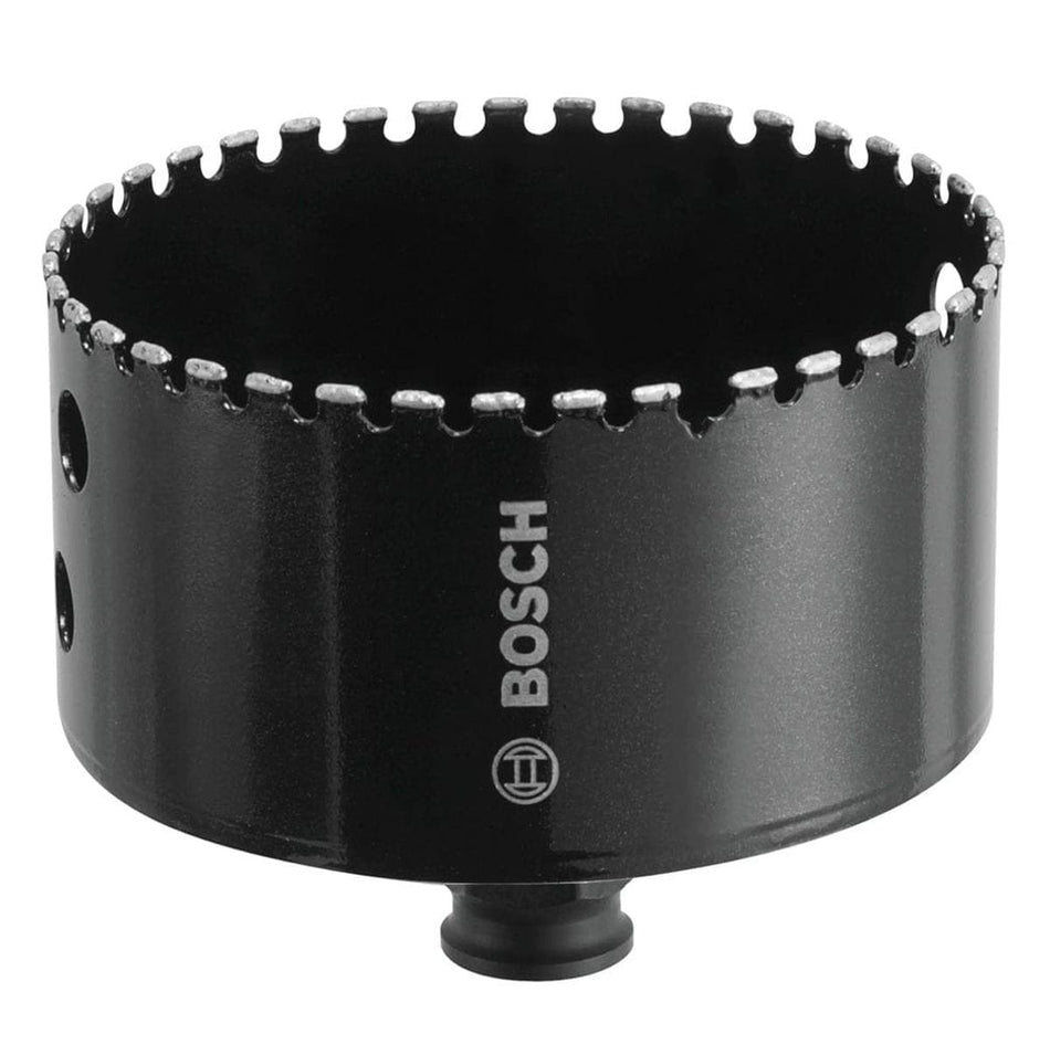 Studio shot of the black Bosch HDG358 diamond hole saw, showcasing the diamond grit cutting edge, side ejection slots, and integral quick change adapter on the bottom.