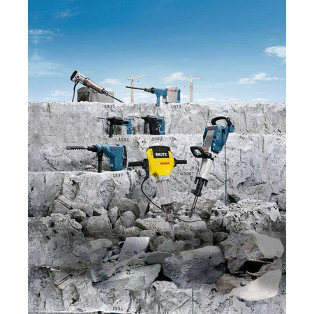 Timeline collage displaying Bosch demolition hammers on a rocky concrete surface from 1932 to present, demonstrating the heavy-duty tools compatible with the SDS-Max R-Tec chisel bit.