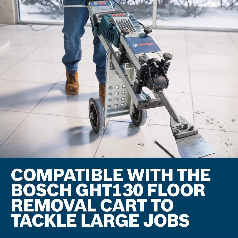 An action view of a worker utilizing a heavy demolition jack hammer mounted on a blue wheeled cart framework to strip large tiles on a commercial jobsite, underneath bold white text that reads Compatible with the Bosch GHT130 Floor Removal Cart to Tackle Large Jobs.