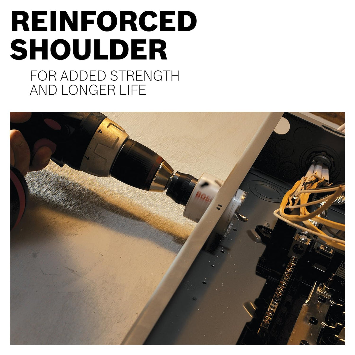 Drilling clean conduit knockouts in an electrical panel with a Bosch reinforced-shoulder bi-metal hole saw to resist torque.
