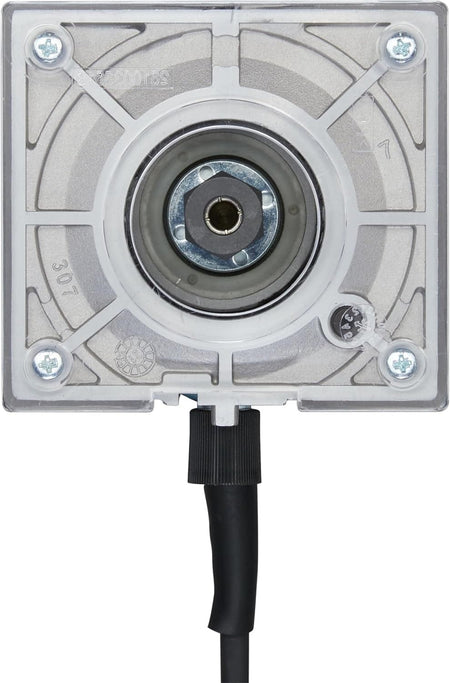 A bottom-up view of the router base showing the clear plastic sub-base, the central collet nut, and the four mounting screws.