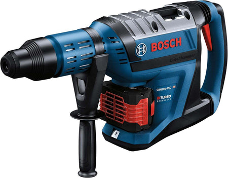Angled front profile of the Bosch PROFACTOR 18V Hitman SDS-max cordless rotary hammer showcasing the rugged blue exterior, adjustable auxiliary side handle, and installed CORE18V high-capacity battery.
