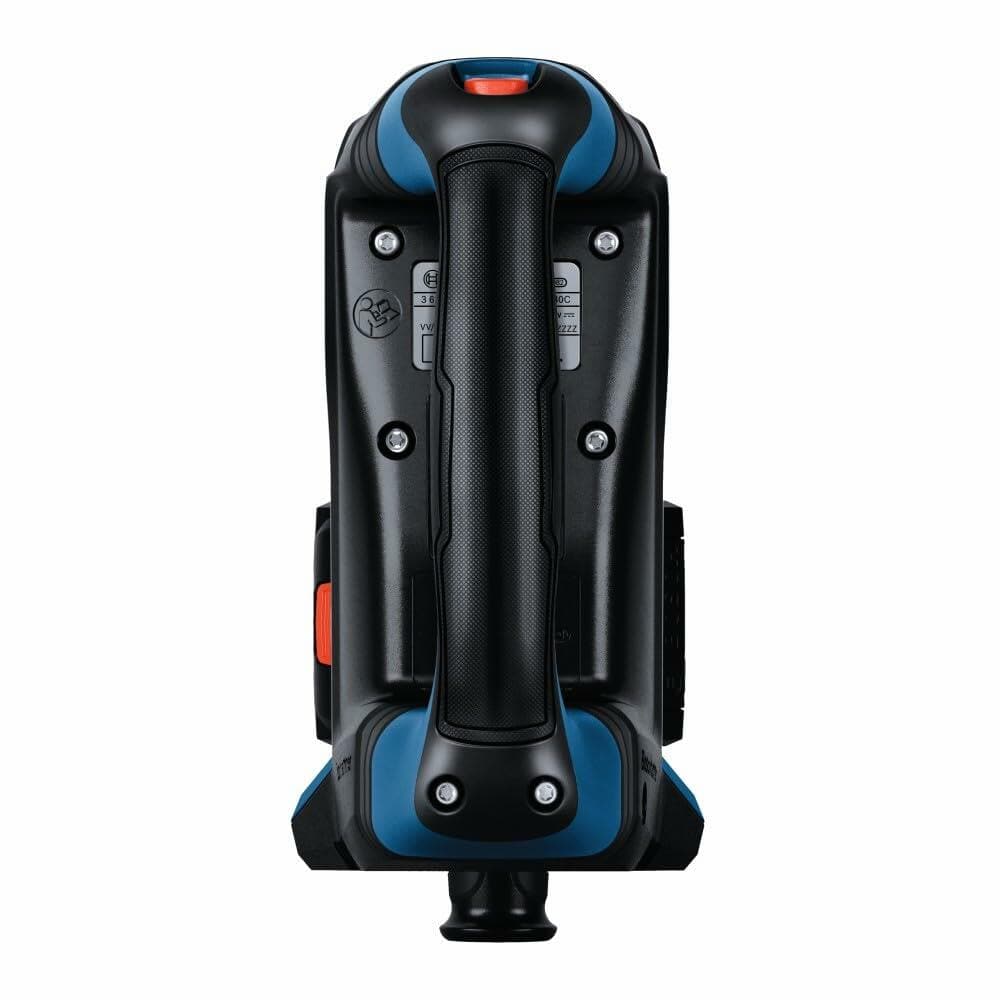 Top view of battery-powered strapping tool with ergonomic handle and control buttons. Black and blue body with orange accents. Designed for tensioning and sealing plastic strapping in packaging applications.