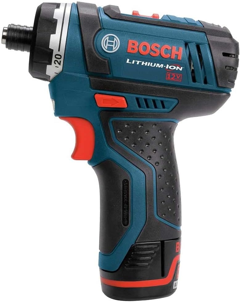 A direct side view of the cordless driver highlighting the ergonomic handle, the large red trigger, and the red forward and reverse selector switch located above the grip.