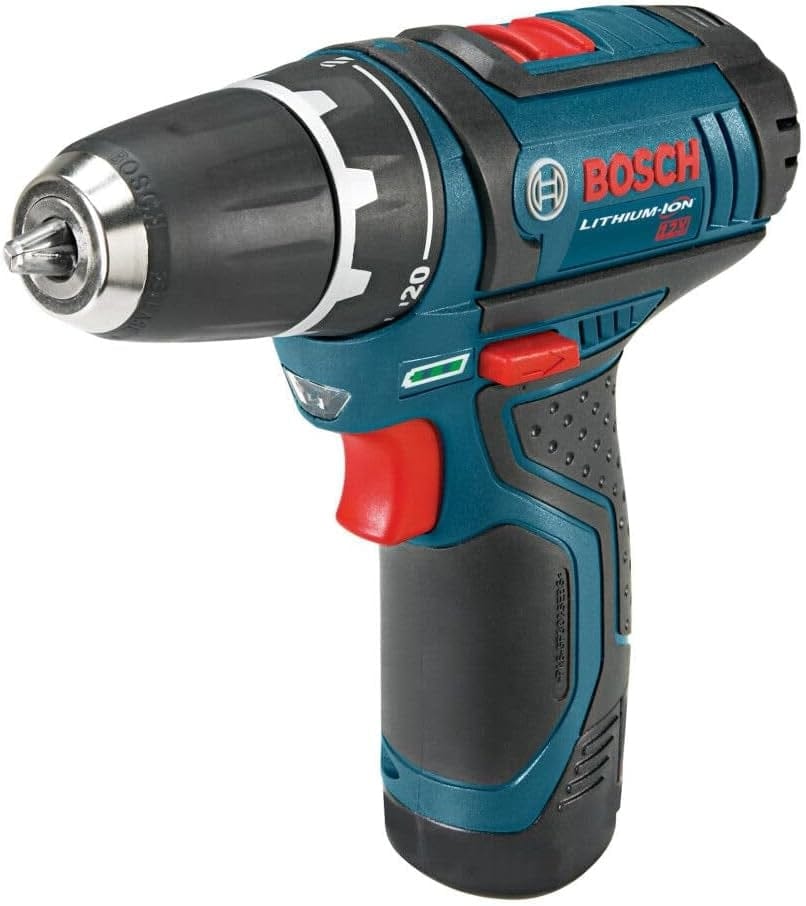 An angled front view of the Bosch PS31-2A drill driver, showcasing the keyless chuck jaws, the LED light located above the trigger, and the rubberized grip texture.