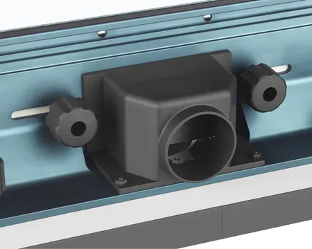 A detailed product close-up showcasing the empty 2-1/2 inch vacuum hose port housing attached to the rear track of the blue anodized aluminum router table fence system.
