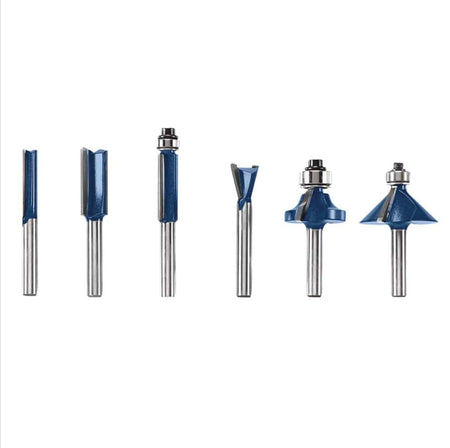 Studio view of six assorted Bosch carbide-tipped router bits with blue shanks arranged in a row.