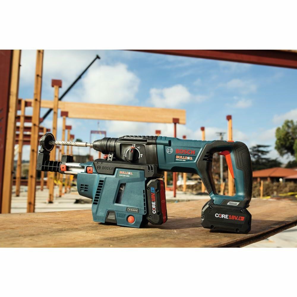 Bosch cordless rotary hammer drill with CORE18V battery displayed on construction site; labeled with Bulldog and Brushless branding