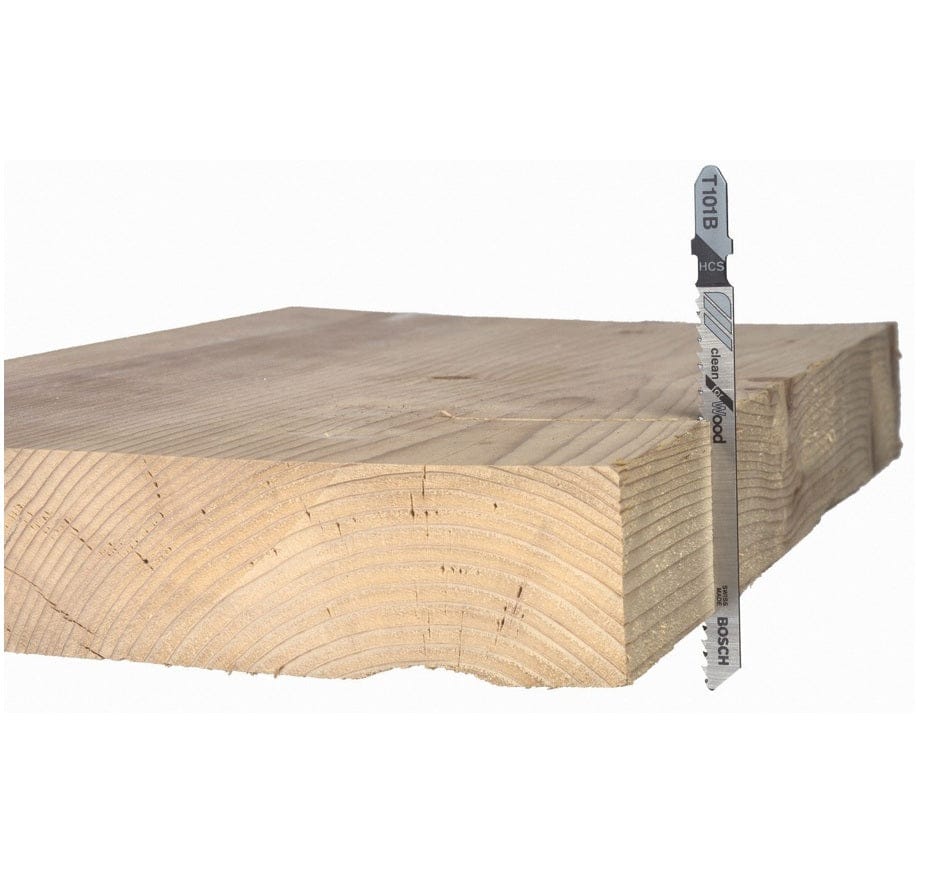 Close-up side view of a Bosch T101B Clean for Wood jigsaw blade inserted into a thick wooden block, demonstrating the clean edge of the cut.