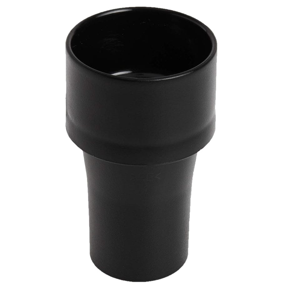 Angled studio view of the black plastic VAC004 adapter, showing the opening designed to fit 2-1/2 inch tool ports.