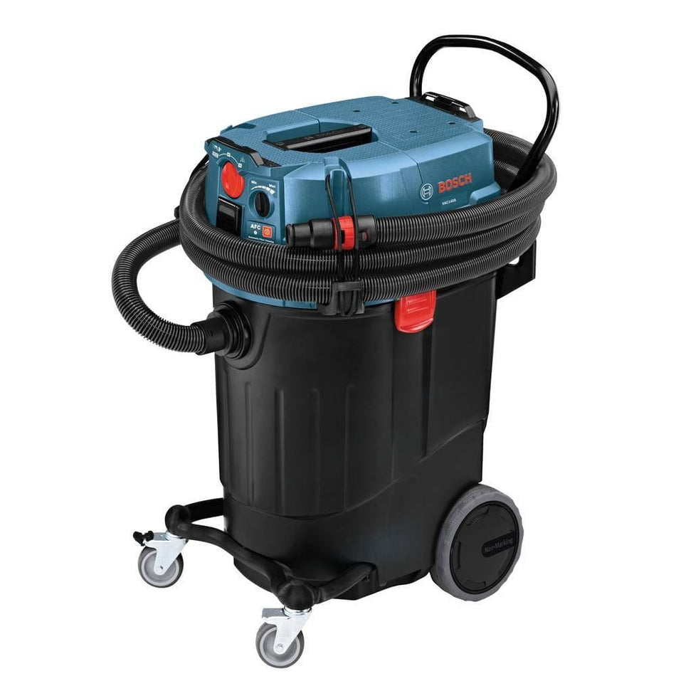 A studio shot of the Bosch VAC140AH 14-gallon dust extractor featuring a blue top housing, a large black collection tank, and heavy-duty rear wheels.