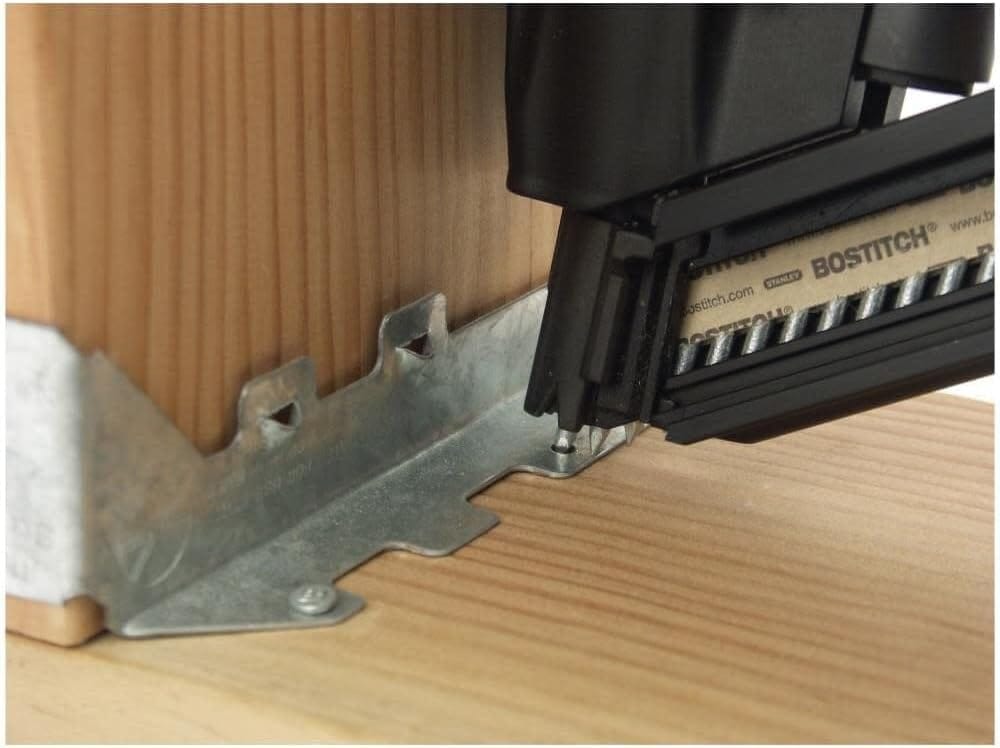 Alternate close-up profile of the Bostitch MCN150 STRAPSHOT showing the sequential-style trigger, safety warnings, and the rear of the compact 35-degree magazine.