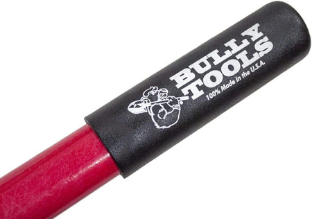 Close-up of the black rubber handle grip featuring the white Bully Tools logo with a bulldog graphic and text stating 100% Made in the U.S.A. on a red fiberglass handle.